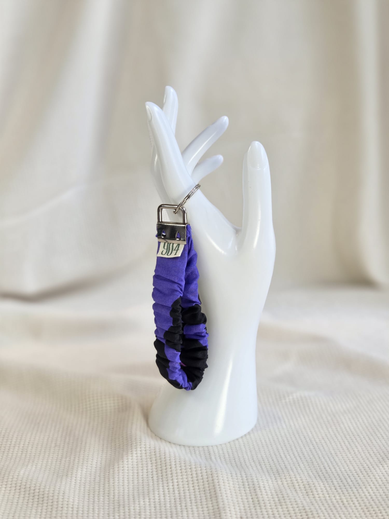 Paars met bloem keycord en sleutelhangers