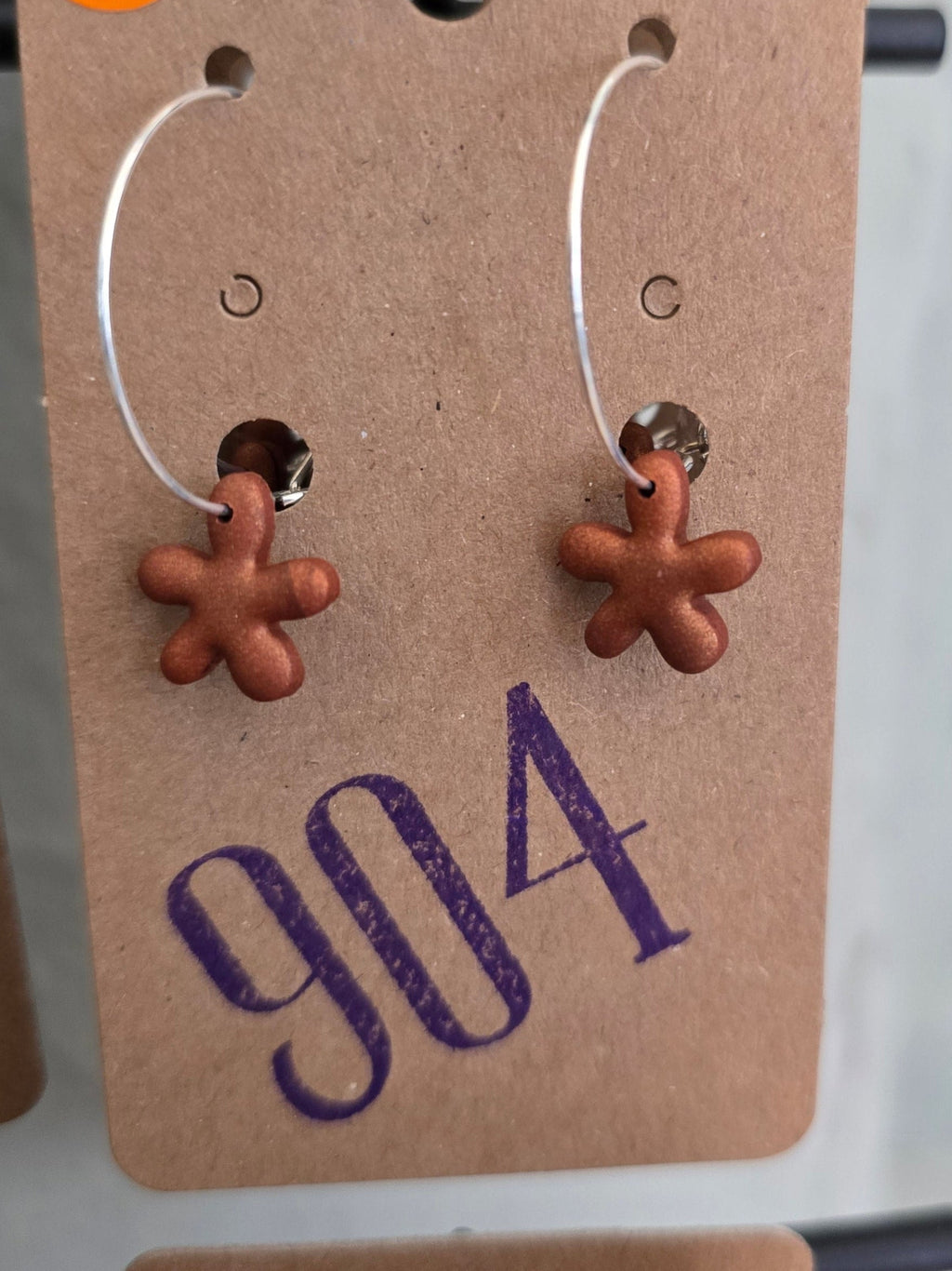 Grote ring met kleine bloem, oorbellen
