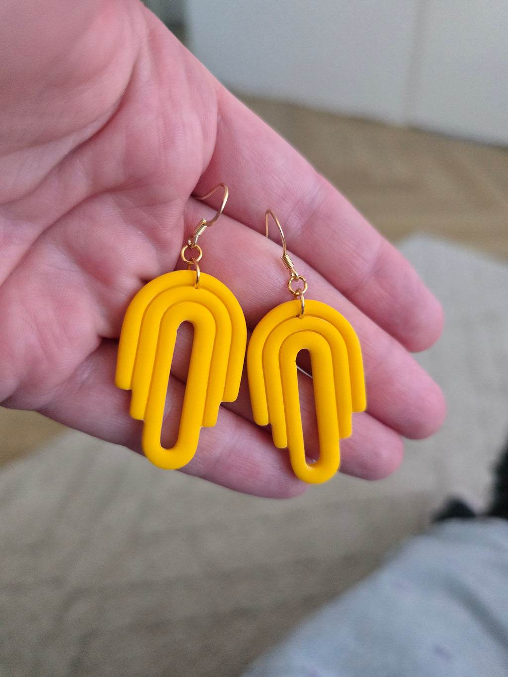 Boog hangers, oorbellen